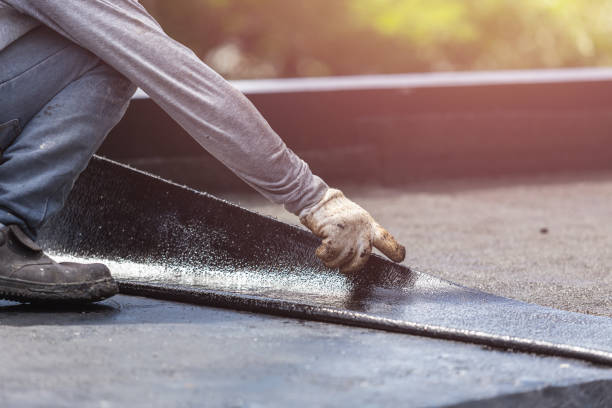 Professional Basement Waterproofing technician working in Northport, NY